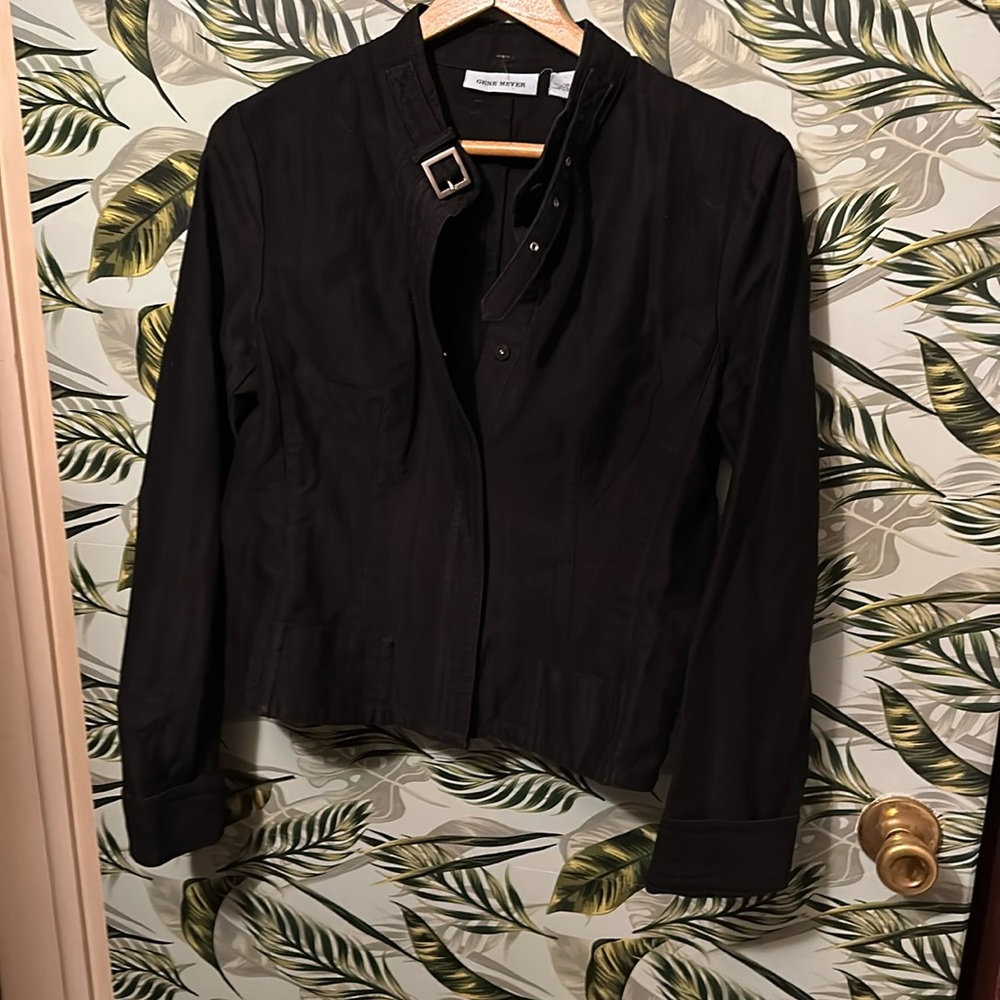 EE31 black jacket with belt buckle at neck Gene Meyer 10